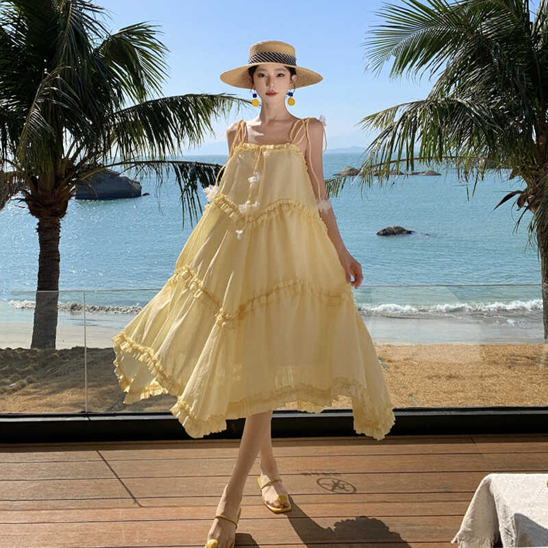 A字裙女 三亚海边旅游度假风黄色吊带连衣裙甜美小清新宽松中长款